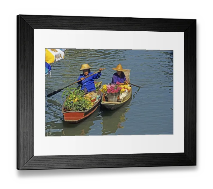 Framed Print : Merchants in their boats at Damnoen Saduak Floating Market