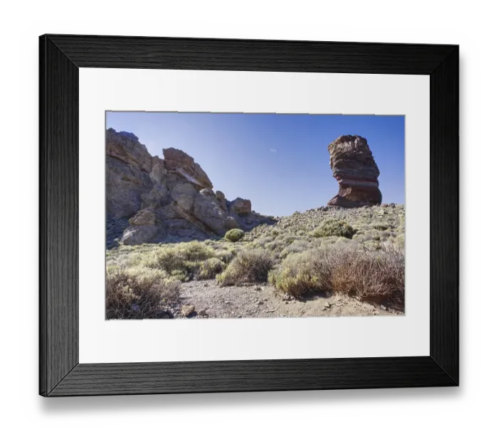 Framed Print : Large rocks in a barren, dry environment