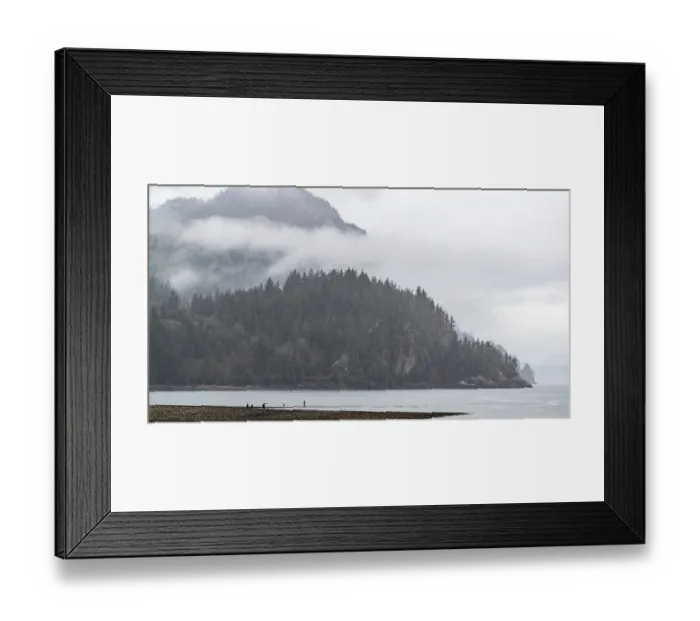 Framed Print : Misty beach scene with fog-covered mountains Framed Print : Misty beach scene with fog-covered mountains