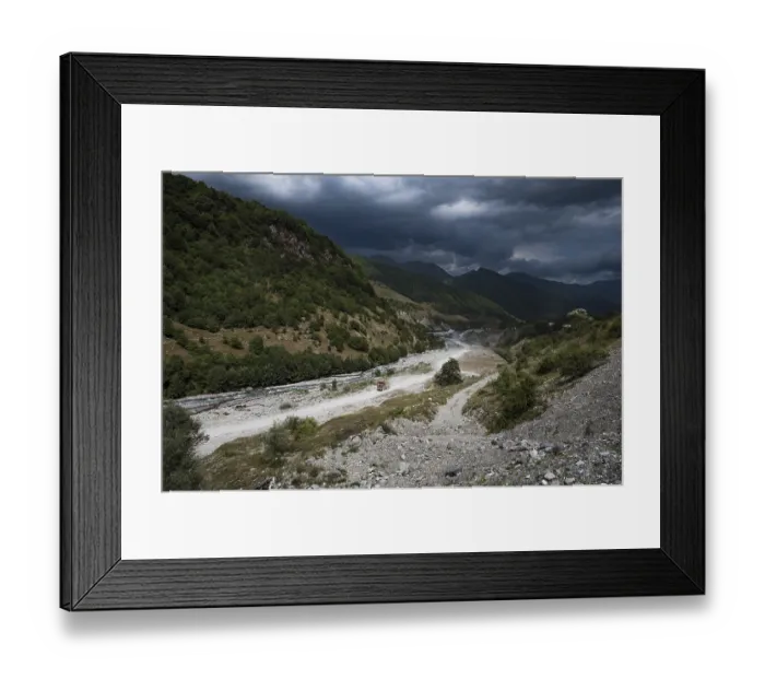 Framed Print : Caucasus mountain landscape on the military road in Georgia with stormy sky Framed Print : Caucasus mountain landscape on the military road in Georgia with stormy sky