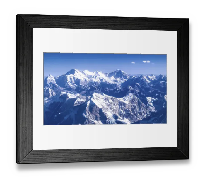 Framed Print : Snowy mountain landscape under bright blue sky Framed Print : Snowy mountain landscape under bright blue sky
