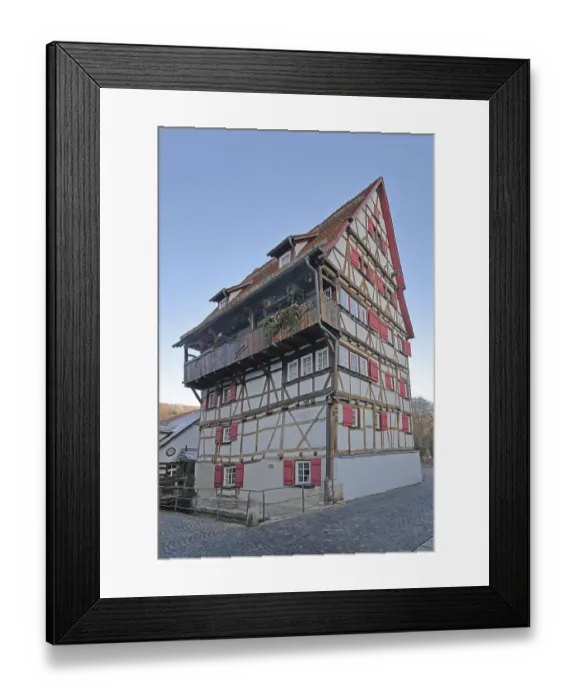 Framed Print : Historic half-timbered house Hoher Will built in 1697 with red shutters Framed Print : Historic half-timbered house Hoher Will built in 1697 with red shutters