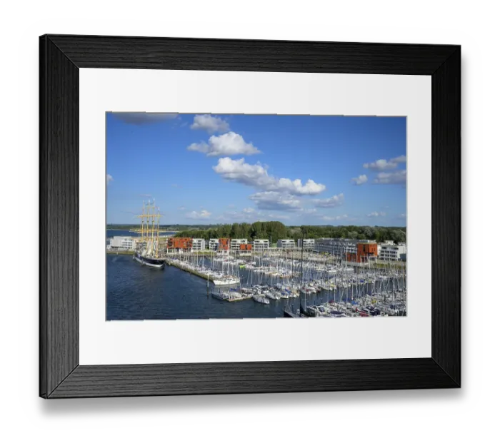 Framed Print : Harbour view with the legendary four-masted PASSAT barque and many boats in front of modern buildings under blue skies