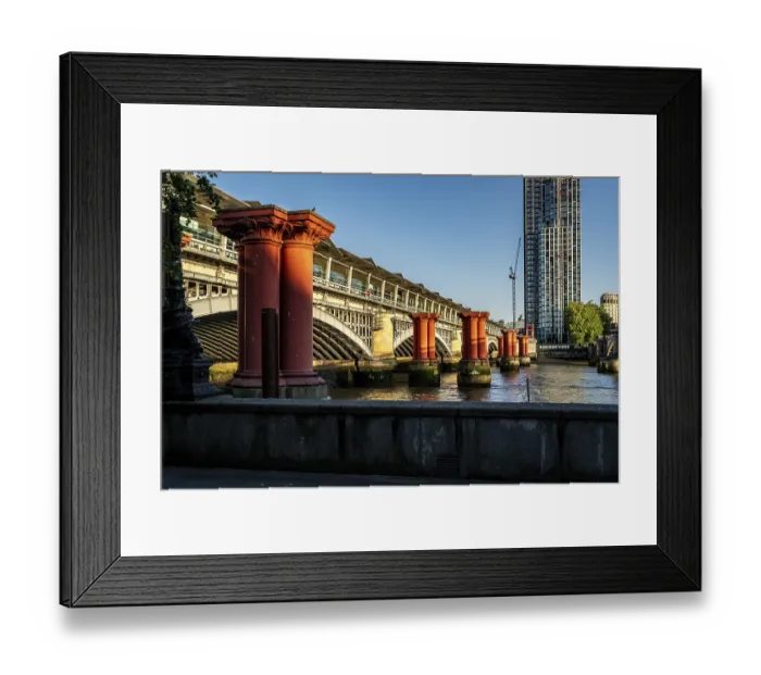 Framed Print : London, United Kingdom - 17 May 2025: The iconic red pillars of the old Blackfriars Railway Bridge