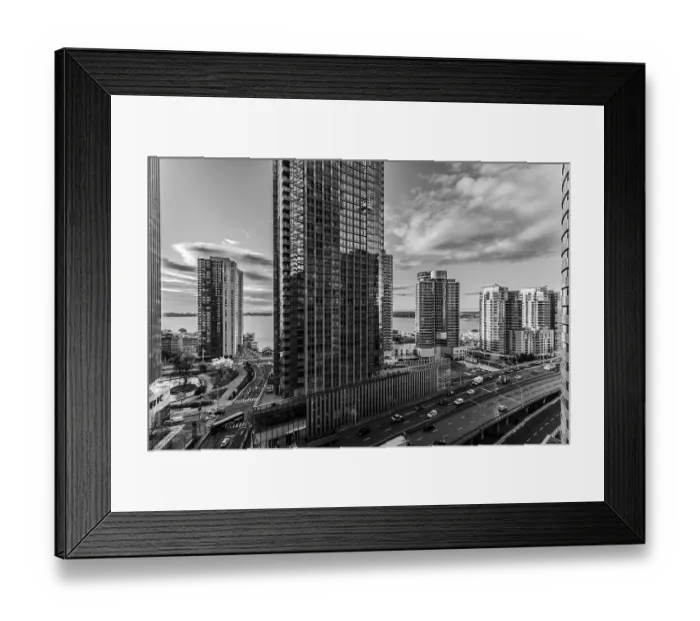 Framed Print : Black and white cityscape with tall skyscrapers