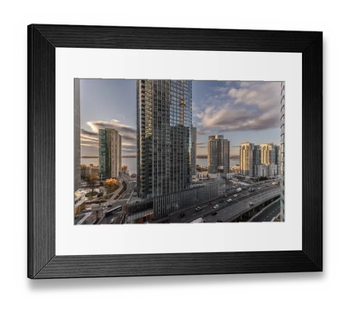 Framed Print : Cityscape with skyscrapers at sunset