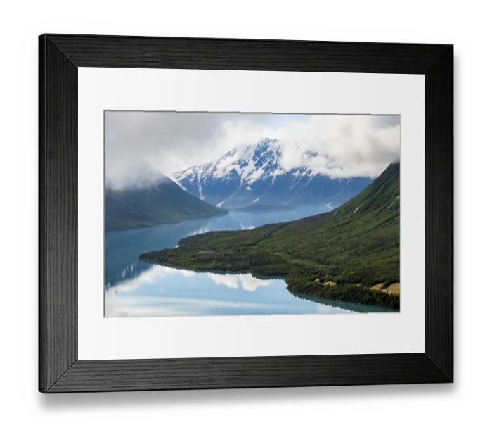Framed Print : View of snowy mountains in spring and turquoise Kenai Lake with reflection Framed Print : View of snowy mountains in spring and turquoise Kenai Lake with reflection