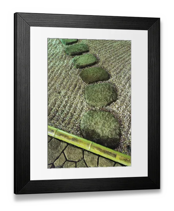 Framed Print : Stone way elements in zen garden under vivid night illumination with sand waves and bamboo pole border