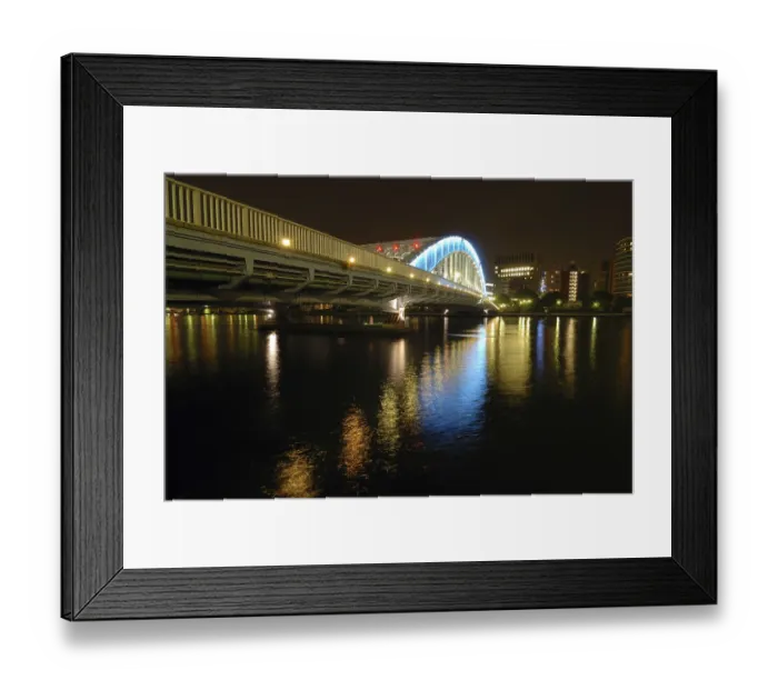 Framed Print : Nighttime colorful reflection of Eitai Bridge illumination in waters of Sumida river at central part of Tokyo