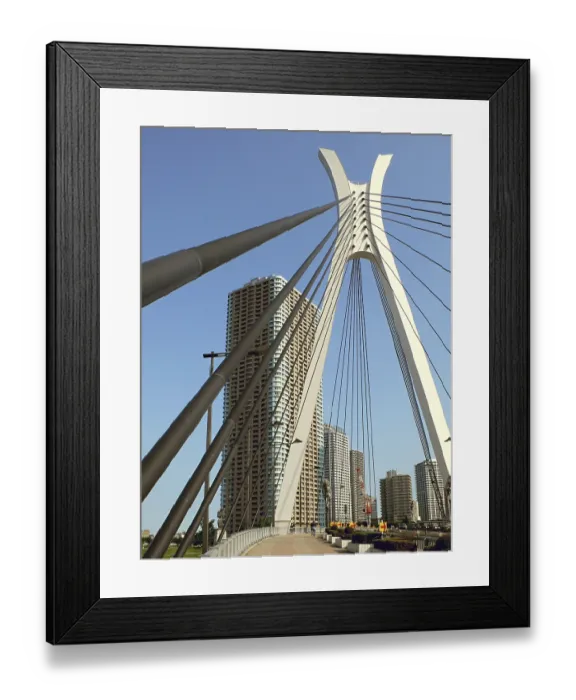 Framed Print : Modern city view over suspension bridge support Framed Print : Modern city view over suspension bridge support