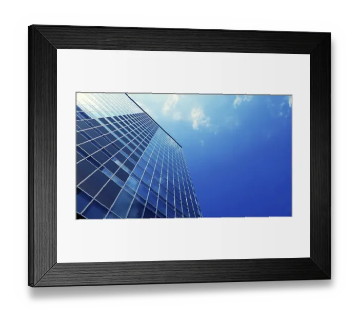 Framed Print : Modern office skyscraper building with blue sky background