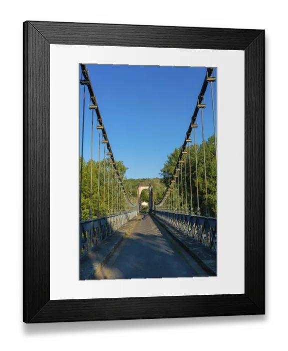 Framed Print : Suspension bridge of Coudes village on river Allier