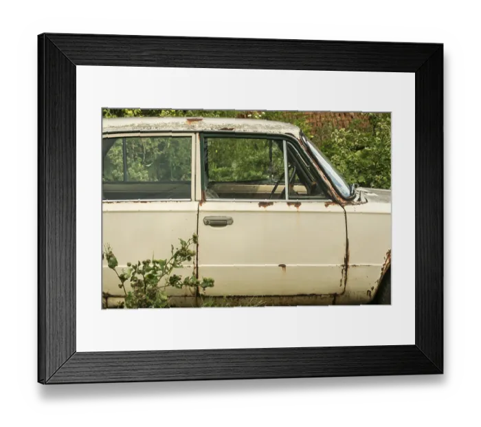 Framed Print : Old weathered abandoned neglected rusty broken vintage obsolete car closeup in rural place