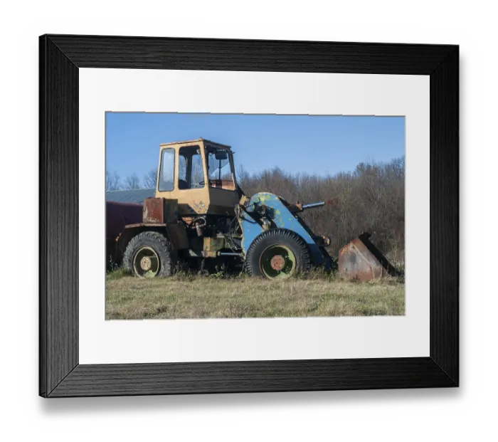 Framed Print : Old vintage bulldozer on countryside meadow in sunny day Framed Print : Old vintage bulldozer on countryside meadow in sunny day