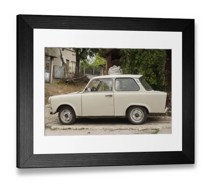 Framed Print : Vintage Trabant car in Eastern Europe village closeup