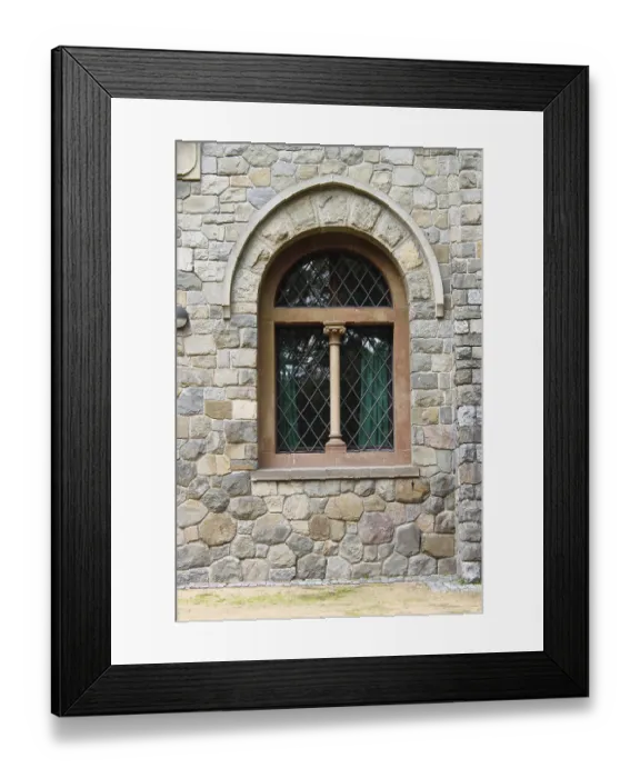 Framed Print : A double lancet window in a medieval castle