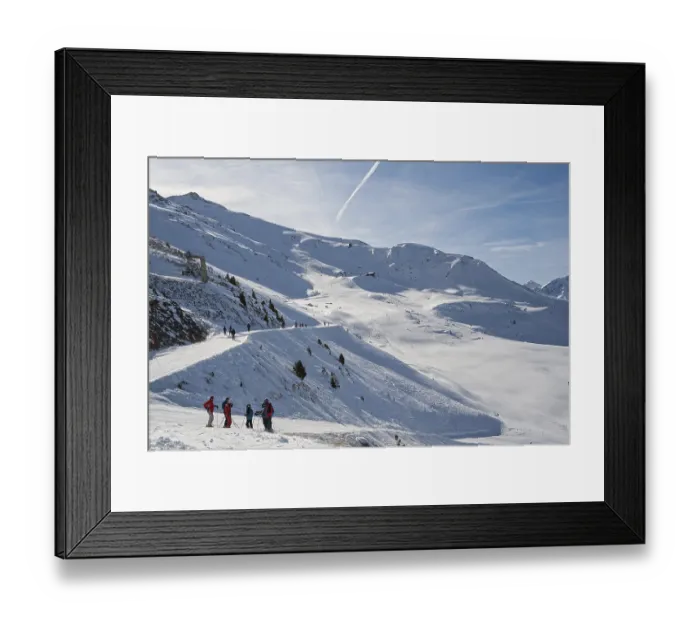 Framed Print : Skiers stand at edge of ski slopes Framed Print : Skiers stand at edge of ski slopes