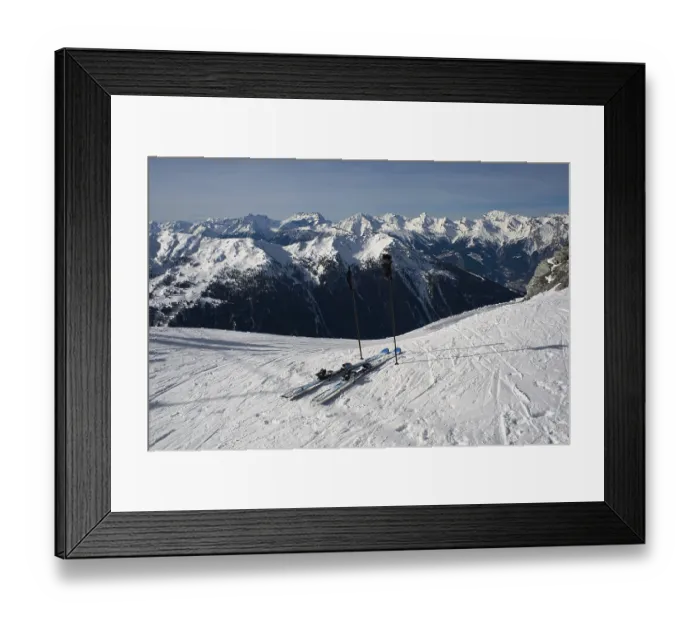 Framed Print : Pair of mountain skis against a mountain landscape Framed Print : Pair of mountain skis against a mountain landscape