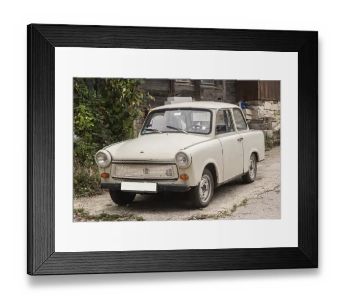 Framed Print : Vintage Trabant car in Eastern Europe village closeup