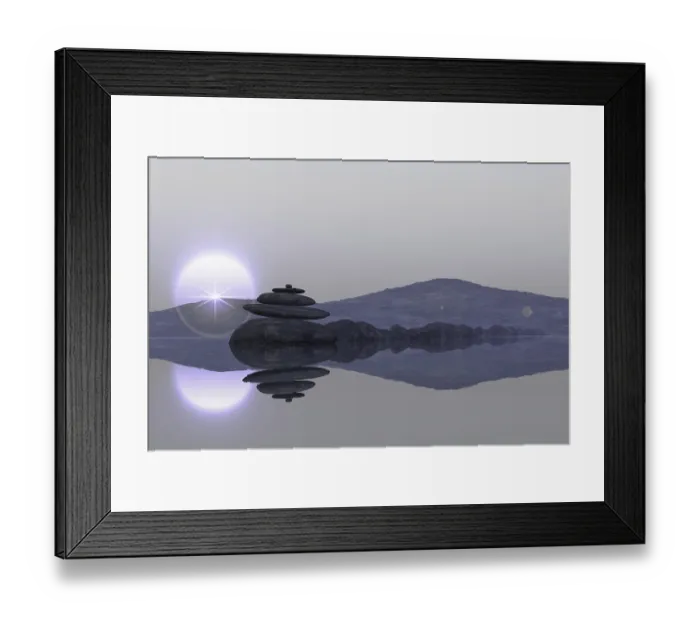 Framed Print : Calm lake beach with stacked stones