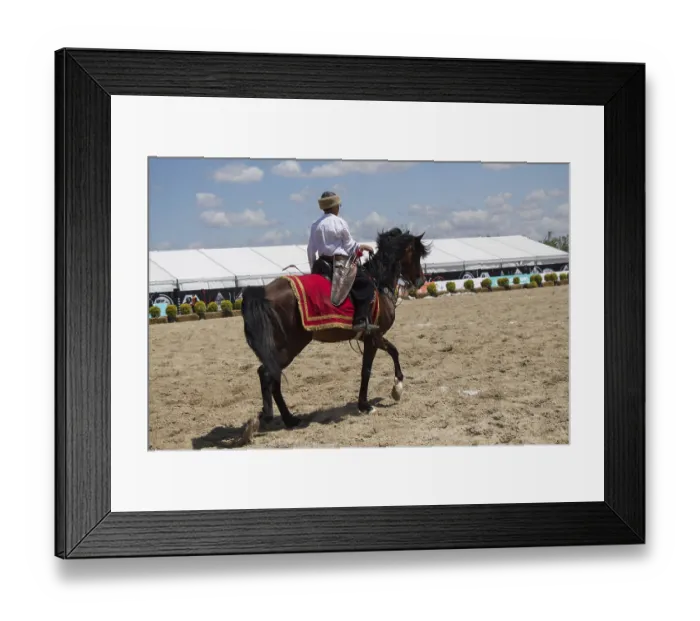 Framed Print : Horseman archer riding in ethnic clothes on horseback