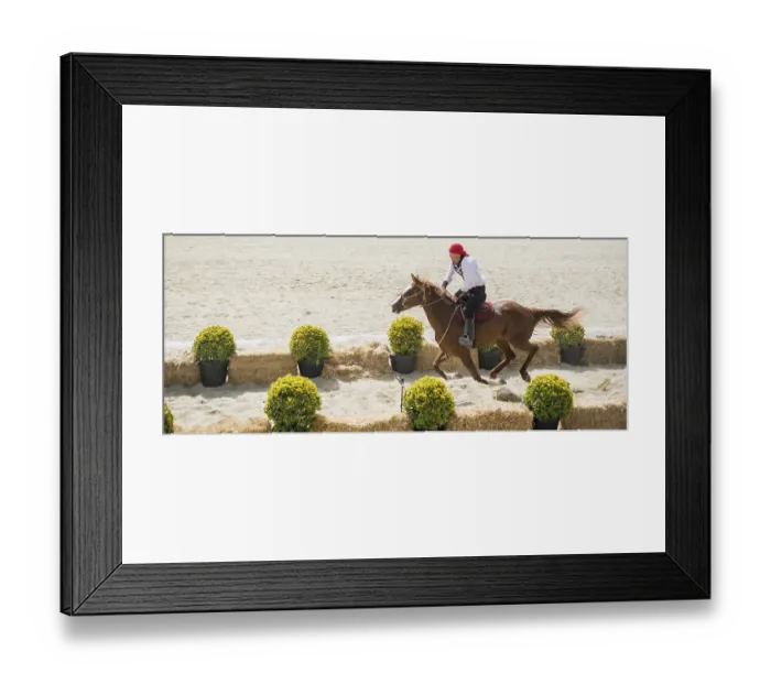 Framed Print : Horseman archer riding in their ethnic clothes on horseback