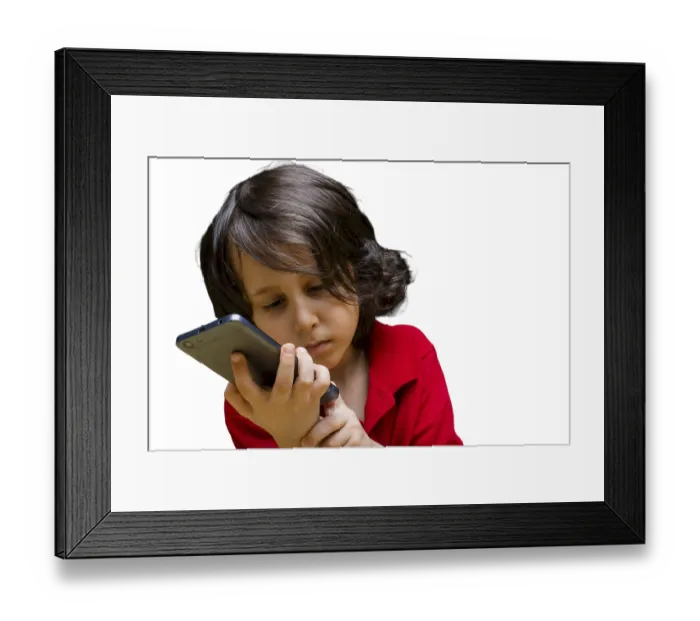 Framed Print : Boy with mobile phone in hand isolated on a white background Framed Print : Boy with mobile phone in hand isolated on a white background