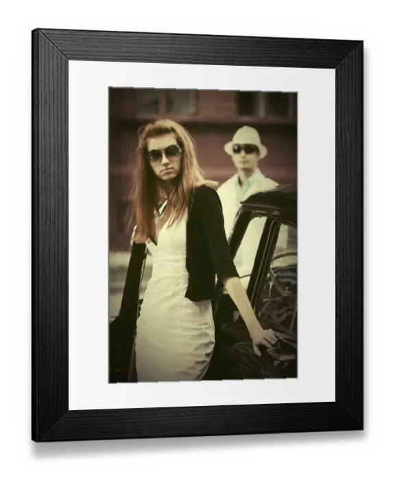 Framed Print : Young fashion woman in sunglasses next to vintage car