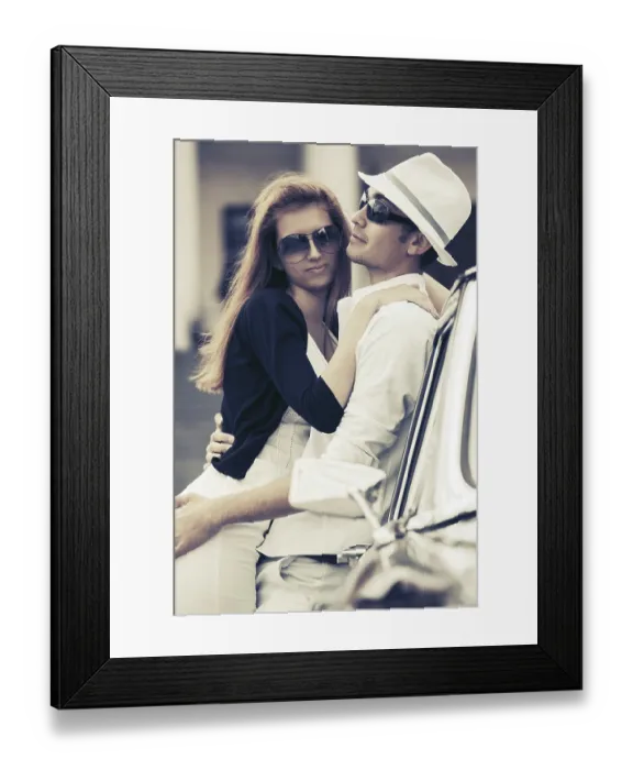 Framed Print : Happy young fashion couple in love next to vintage car