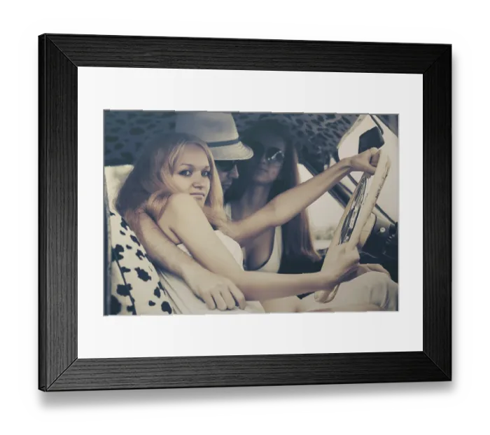 Framed Print : Young fashion people driving vintage car