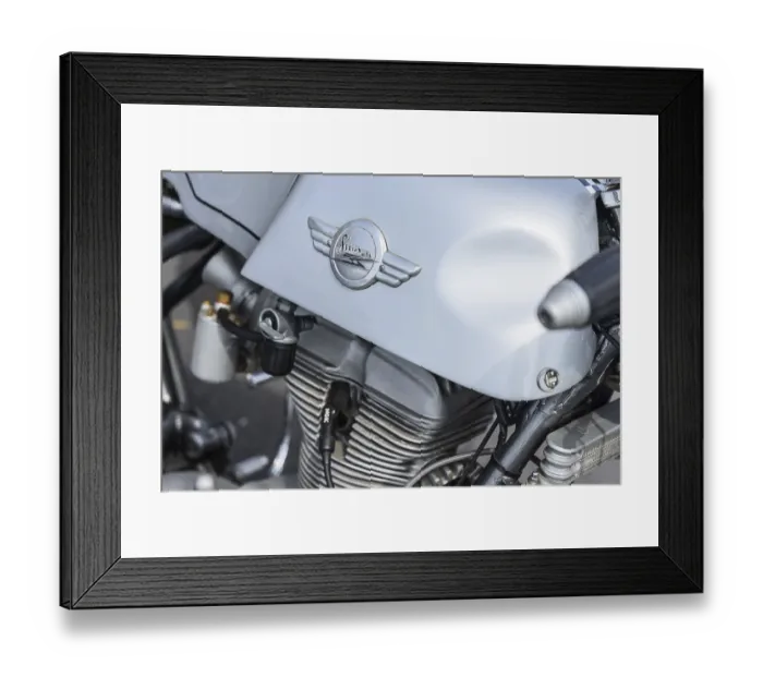 Framed Print : LINTHE, GERMANY - MAY 27, 2023: The fragment of sports motorcycle Simson AWO RS 350 Framed Print : LINTHE, GERMANY - MAY 27, 2023: The fragment of sports motorcycle Simson AWO RS 350