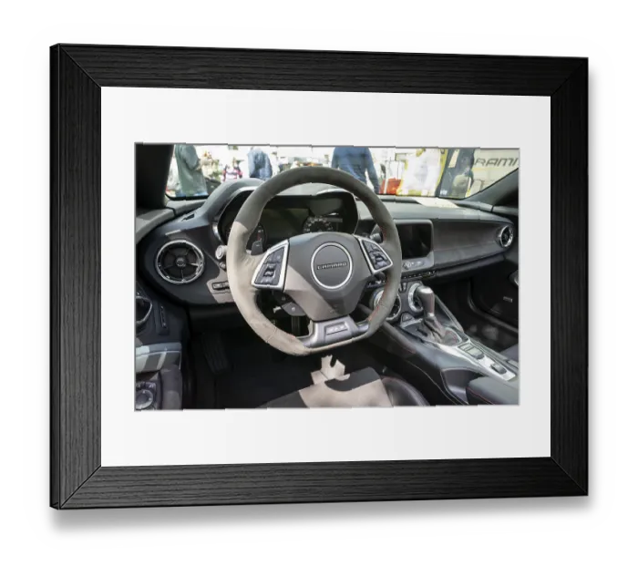 Framed Print : BERLIN - MAY 04, 2024: The interior of a muscle car Chevrolet Camaro (sixth generation)