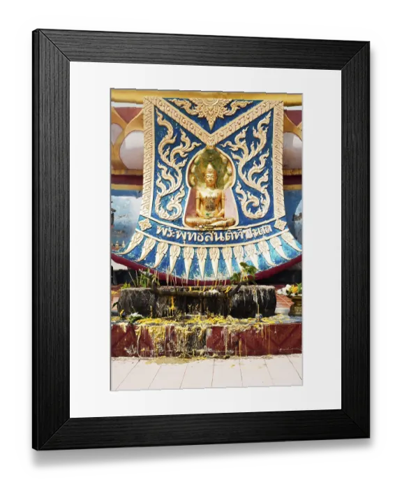 Framed Print : Golden statue of Buddha in meditation (Thursday) with offerings in Wat Phra Yai Temple