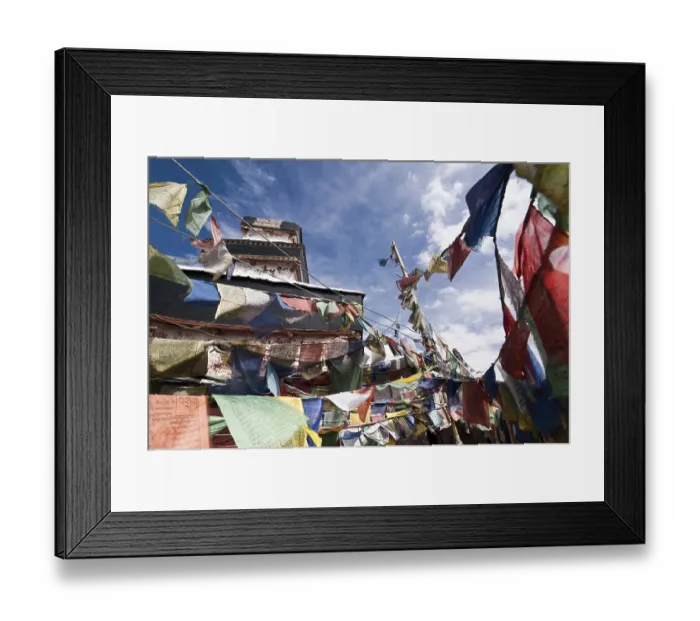 Framed Print : Praying flags over blue sky at Buddhist monastery