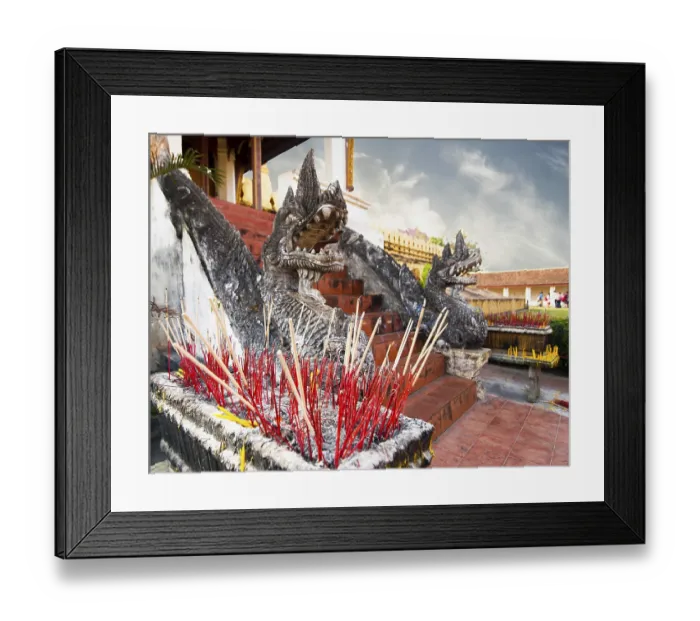Framed Print : Ritual smoke of aroma sticks at Golden buddhist pagoda Phra That Luang Temple