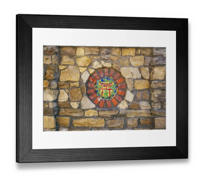 Framed Print : Circular mosaic religious symbol of Shinto on stone wall