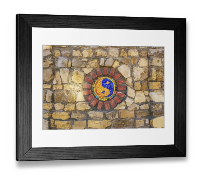 Framed Print : Circular mosaic religious symbol of Yin and yang on stone wall Framed Print : Circular mosaic religious symbol of Yin and yang on stone wall