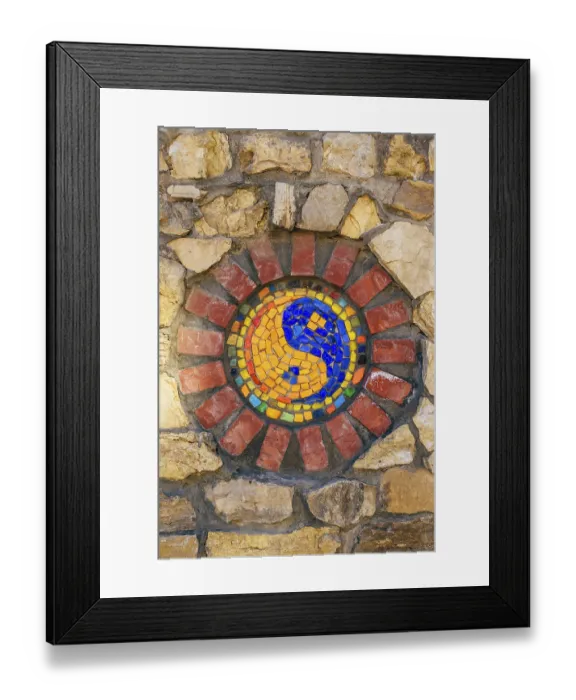 Framed Print : Circular mosaic religious symbol of Yin and yang on stone wall Framed Print : Circular mosaic religious symbol of Yin and yang on stone wall