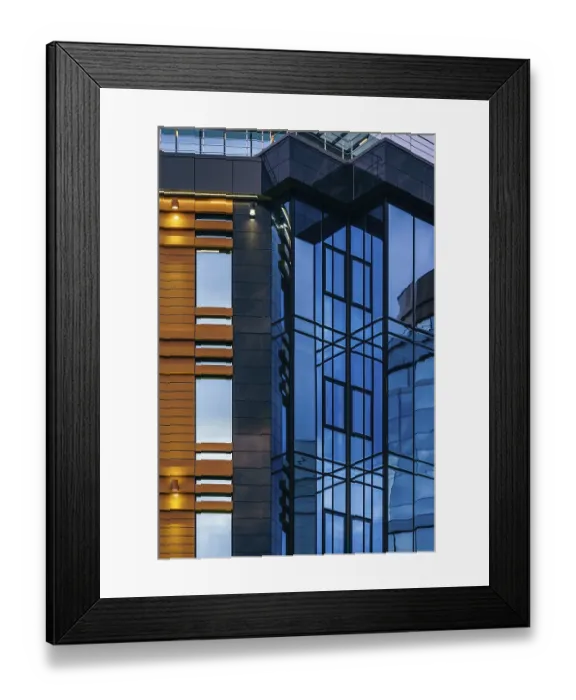 Framed Print : Modern high-rise office building with a glass facade Framed Print : Modern high-rise office building with a glass facade