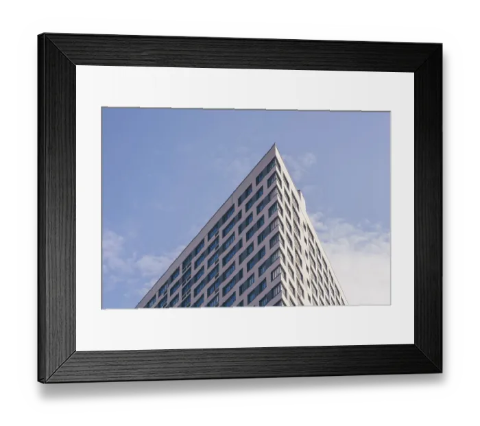Framed Print : Angle of the Skyscraper on the Cloudy Sky Background