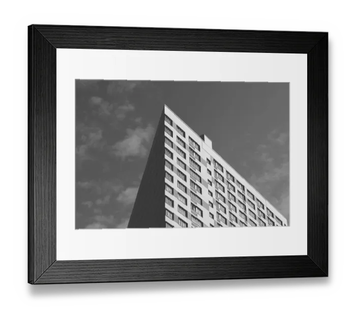 Framed Print : Angle of the Skyscraper on the Cloudy Sky Background