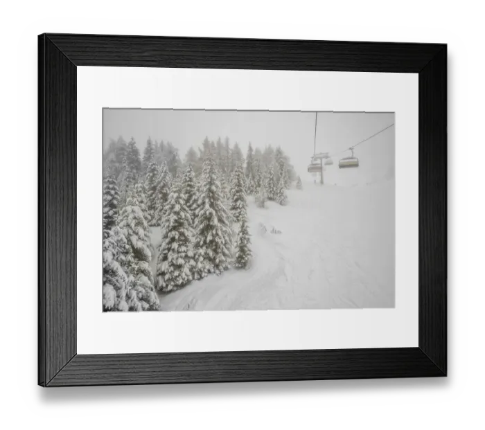 Framed Print : Winter forest and chairlift in snowfall at alpine ski resort Framed Print : Winter forest and chairlift in snowfall at alpine ski resort