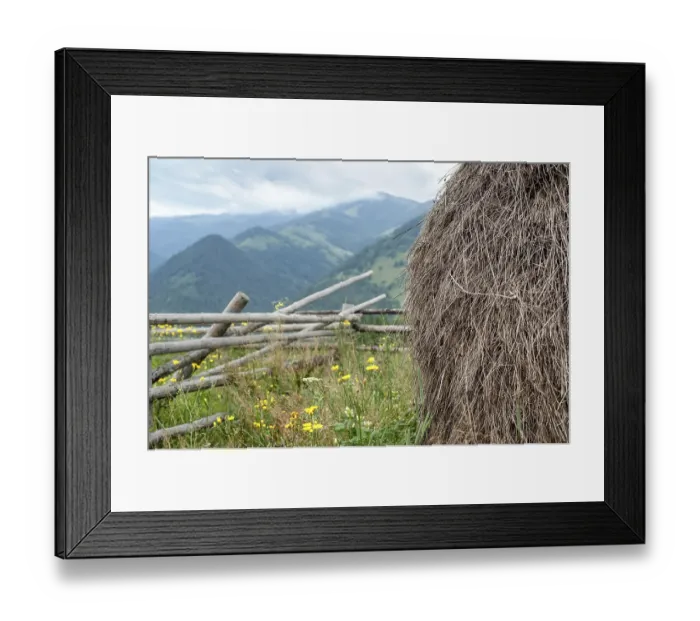 Framed Print : Foggy morning landscape with hay stack on meadow at highland Carpathian mountains