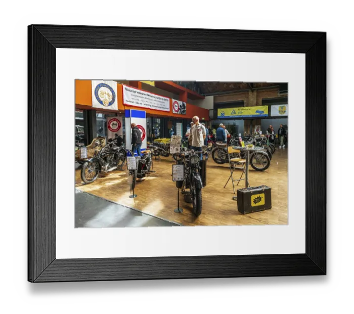 Framed Print : BERLIN - MAY 11, 2019: Various vintage motorcycles stand in a row