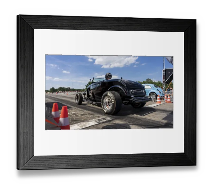 Framed Print : FINOWFURT, GERMANY - JUNE 28, 2024: The custom hot rod on the racing line