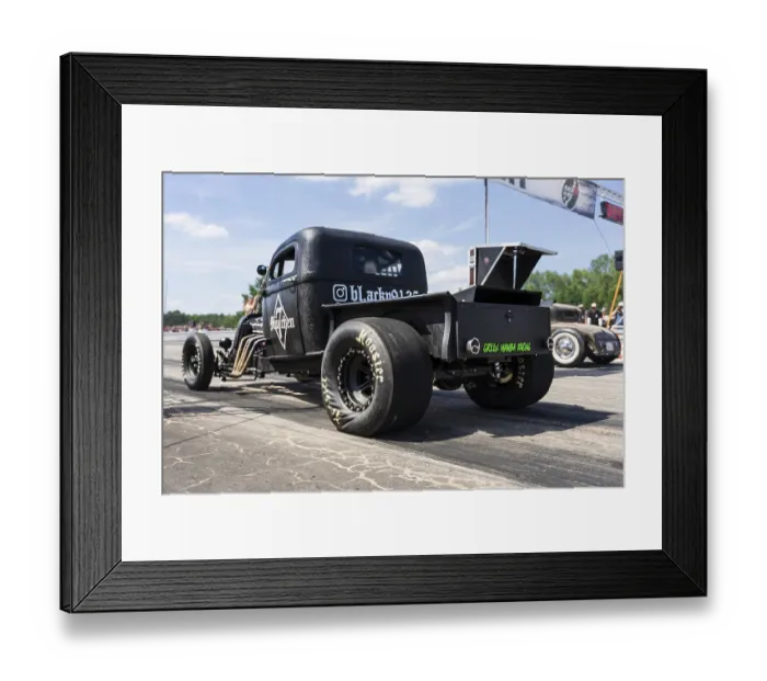 Framed Print : FINOWFURT, GERMANY - JUNE 28, 2024: The custom hot rod (poickup truck) on the racing line