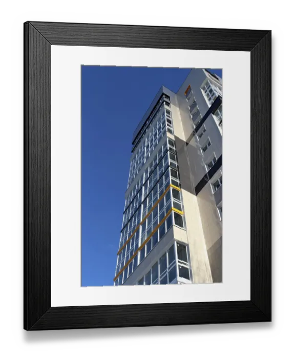 Framed Print : Modern high-rise apartment buildings against the blue sky low angle view Framed Print : Modern high-rise apartment buildings against the blue sky low angle view