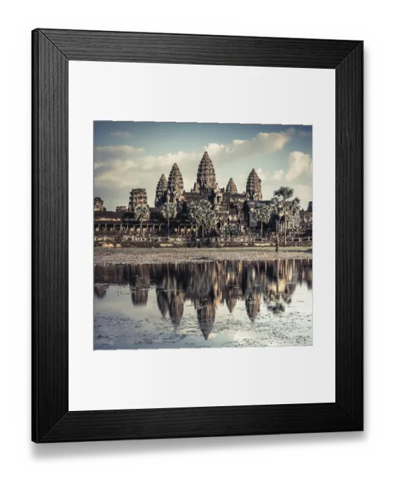Framed Print : Ancient Khmer architecture. Amazing view of Angkor Thom temple under blue sky Framed Print : Ancient Khmer architecture. Amazing view of Angkor Thom temple under blue sky