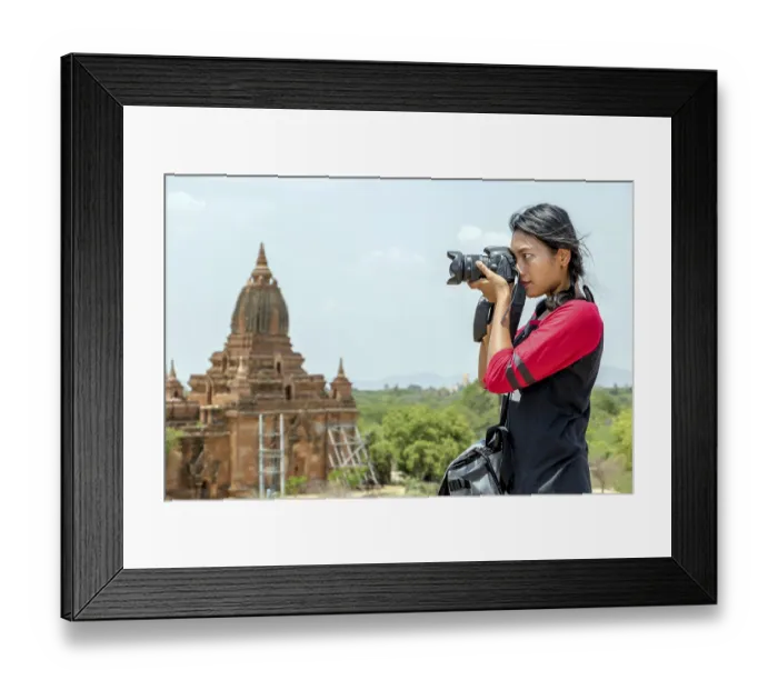 Framed Print : The tourist in Burma is photographing historical monuments