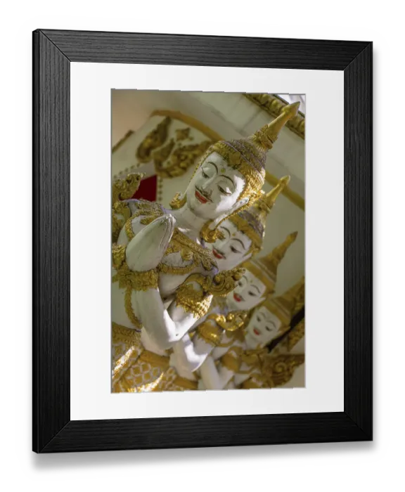 Framed Print : Row of praying mythological figures of the Hindu religion